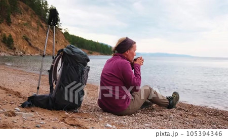 Hiking tourism adventure. Backpacker hiker woman looking at